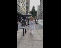 Two girls wear similar dresses in different colors 