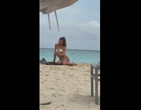 Woman white bikini selfie beach loud jetski