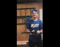 Grey shirt guy blue leaf blower garage 