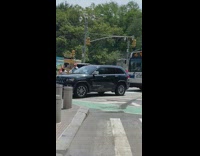 Indian dance party blocks cars on street 