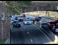 Car went over barricade on highway accident