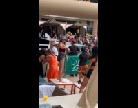 Woman sings and twerks near Snopp Dogg