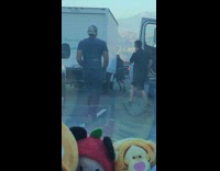 Truck stopped on freeway everyone gets out to help