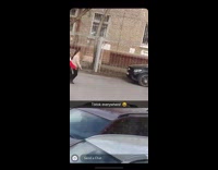 Two girls dance parking lot red jacket 