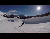 Collab JerrySlams - Snowboarder records friend with selfie stick camera and falls after jumping off ramp