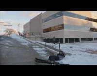 Skier grinds on rail, falls off and gets caught in caution tape 