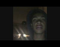 Guy in hoodie tells scary story in the dark with soft voice