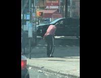 Random guy dance while smoke on street