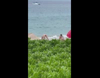 Woman bikini bend over hand stand beach Part 1