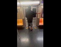Collab Subway_Creatures - Man stand in train pee in shorts