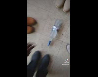 Woman pretends playing drinking game with friends but is only herself