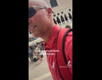 Collab ClipsIG - Man red collared shirt walk street Europe