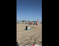 Collab Kook Of The Day - Guy drags blue boogie board speaker sand 