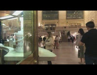 Woman in jacket tiktok dance at the train station