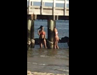 Two woman photo shoot under bridge