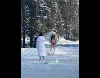 Woman bikini with jacket poses outside snow