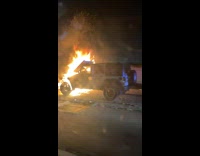 Submitter passes by burning jeep on highway