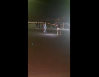 Woman jean dress dance middle of road