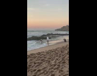 Girl white hat waves hit white umbrella
