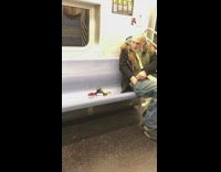 Old man empties his pockets and puts pills on subway seat
