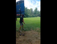Man swings golf club fell down slow motion