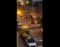 Collab WINY - Man perform hold torch and blows fire 