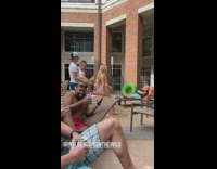 5 friends dance for video near sleeping guy at pool 
