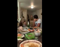 Guy gets call about heavy package Friendsgiving 