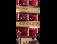 Woman black dress poses on opera balcony Part 1