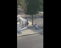 Girl black leggings street corner black railings