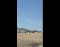 Plane fly hover over desert houses slowly