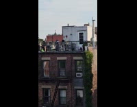 Man DJ setup perform on building rooftop