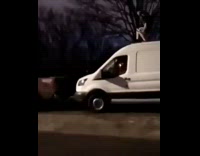 man jumps from white van to truck fail