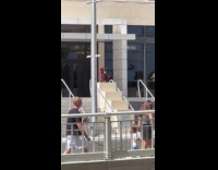 Collab IITW - Person Deadpool costume tiktok dance beside stairs