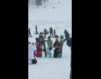 Shirtless girls bra middle finger snowboard mountain 