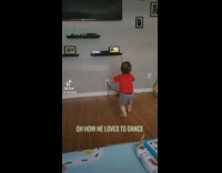Baby dances in living room