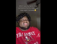 Guy tries to show friend funny video 