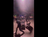 Guy jumps and tries to break table but misses