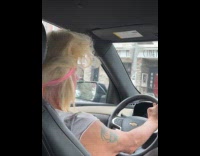 Man with messy blonde hair uber driver