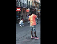 Red hat guy squats yellow snake neck 