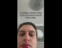 Guy taking picture of back of head for curls
