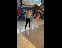 Collab IITW - Two Ladies Hold Hands as they Walk