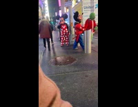 People in Costume and Mascots Crosses Street