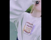 White sweater girl dreams skateboard black bottle