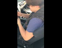 Guy has trouble getting out of car 