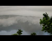 Guy Sees Huge Rolling Wall Cloud in Sky 