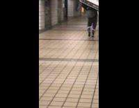 Collab Subway Creatures - Guy carries new TV box over his head through subway station