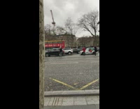 Woman stands street picture Arc de Triumphe 