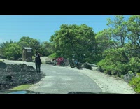 Bike Enthusiast Takes Photos Across Road 