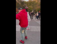 Guy balancing ball dances to drums 